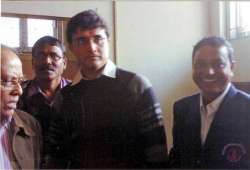 <p>Sahadev Barman with with Sourav Ganguly</p>
